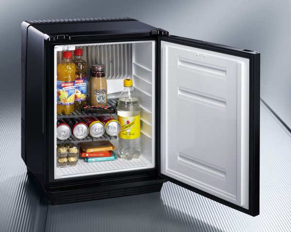 Black Dometic minicool silencio ds300 minibar fridge with the door wide open