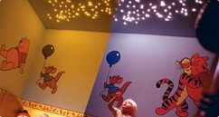 kids bedroom lit up with a fibre optic star ceiling kit