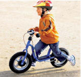 Boy riding Puky Bike