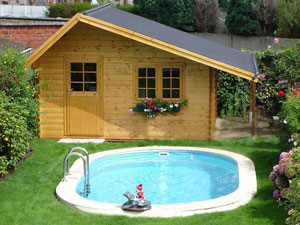 Solar Pool Heating matting on the roof of a garden shed